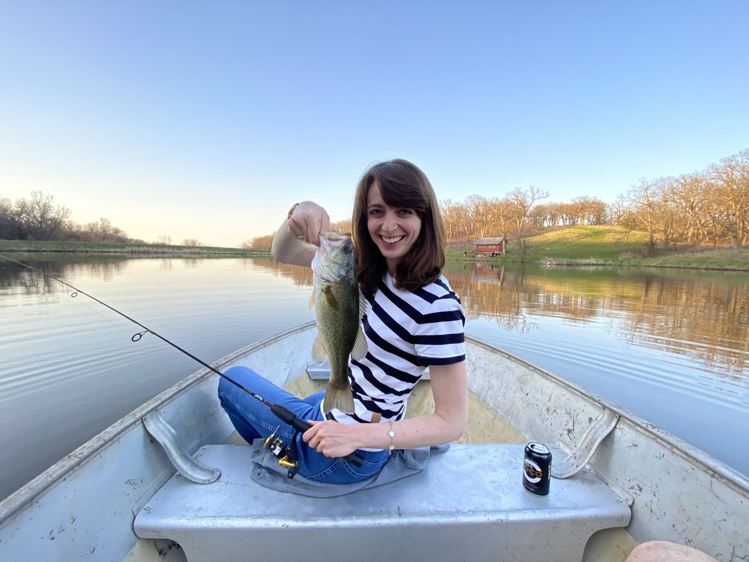 New board member Mollu Cutler fishing in a boat