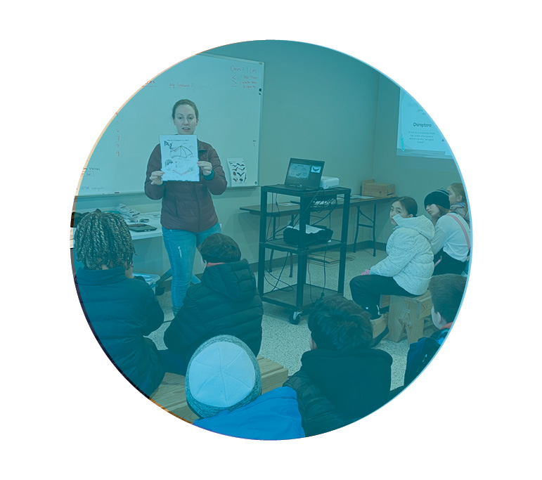 Circular image of students in a classroom