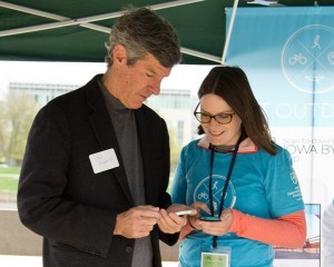 INHF Digital Outreach Assistant Kerri Sorrell shows off the IBT app at its launch.